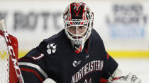 FILE - Northeastern goaltender Devon Levi is shown during an NCAA college hockey game against Boston College on Friday, Oct. 15, 2021, in Chestnut Hill, Mass. Levi is expected to be Canada’s starter in the net for the Beijing Olympics. (AP Photo/Winslow Townson, File)