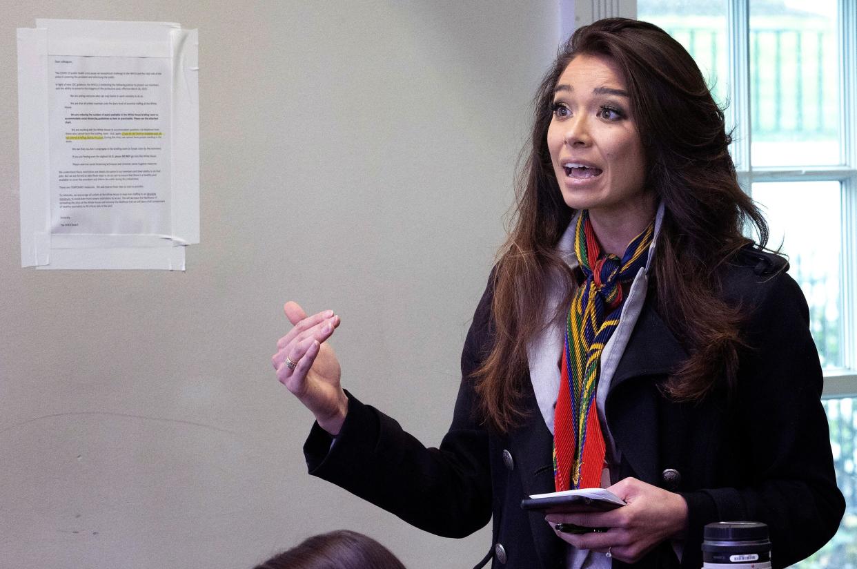 Chanel Rion of OAN asks a question during the daily White House coronavirus briefing on April 1. (Win McNamee via Getty Images)