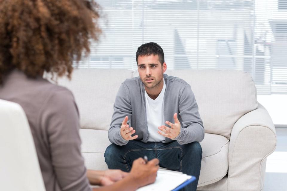 Man talks to female therapist.