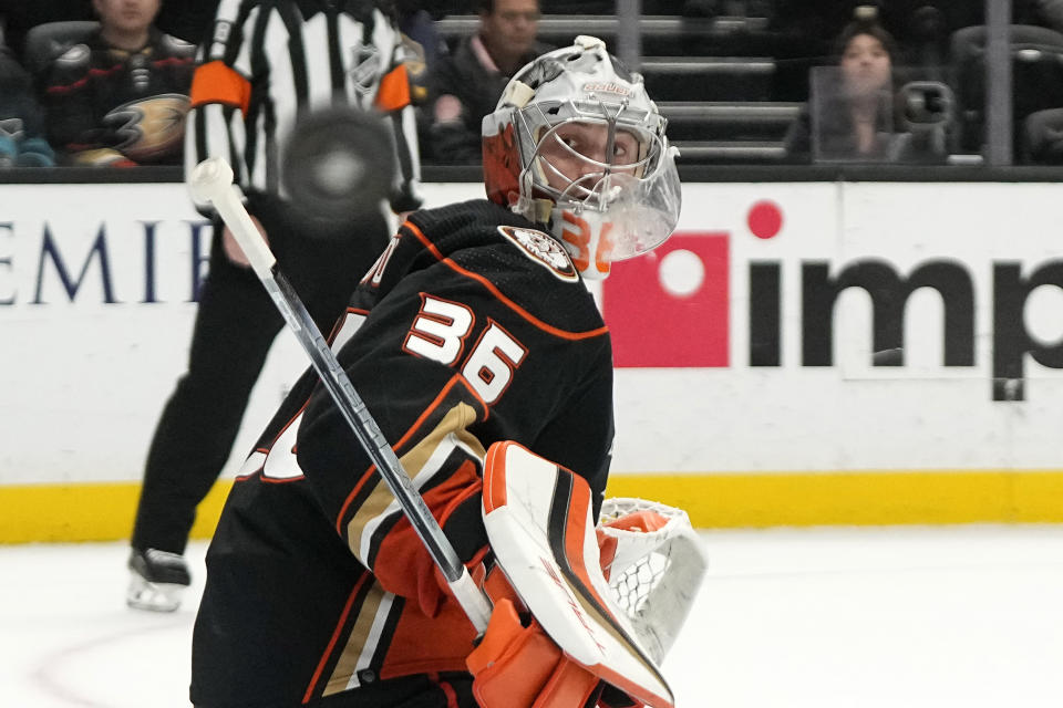 Anaheim Ducks goaltender John Gibson watches the puck go by during the third period of an NHL hockey game against the San Jose Sharks Wednesday, Jan. 31, 2024, in Anaheim, Calif. (AP Photo/Mark J. Terrill)