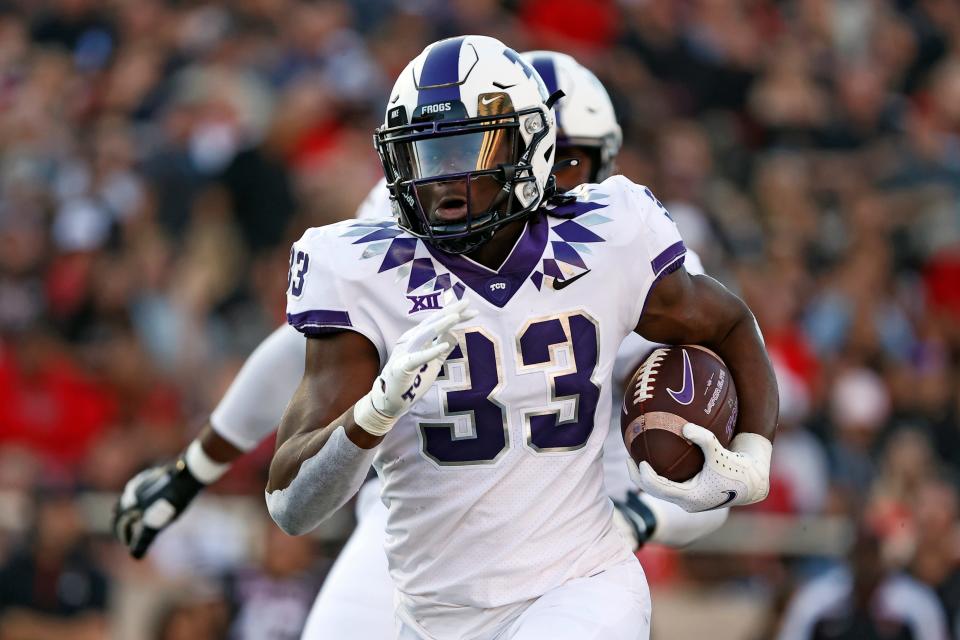 TCU running back Kendre Miller (33) has rushed for a touchdown in each of his past nine games and for more than 100 yards in five of his past six games.