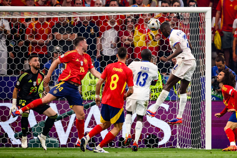 TOPSHOT - France's forward #12 Randal Kolo Muani heads the ball and scores his team's first goal during the UEFA Euro 2024 semi-final football match between Spain and France at the Munich Football Arena in Munich on July 9, 2024. (Photo by FRANCK FIFE / AFP) (Photo by FRANCK FIFE/AFP via Getty Images)