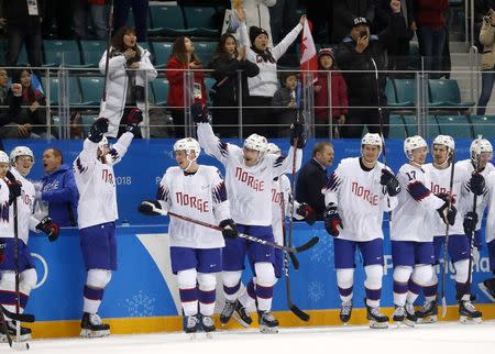 Ice Hockey - Pyeongchang 2018 Winter Olympics - Men's Playoff Match - Slovenia v Norway - Gangneung Hockey Centre, Gangneung, South Korea - February 20, 2018 - Players of Norway's team celebrate their win. REUTERS/Kim Kyung-Hoon