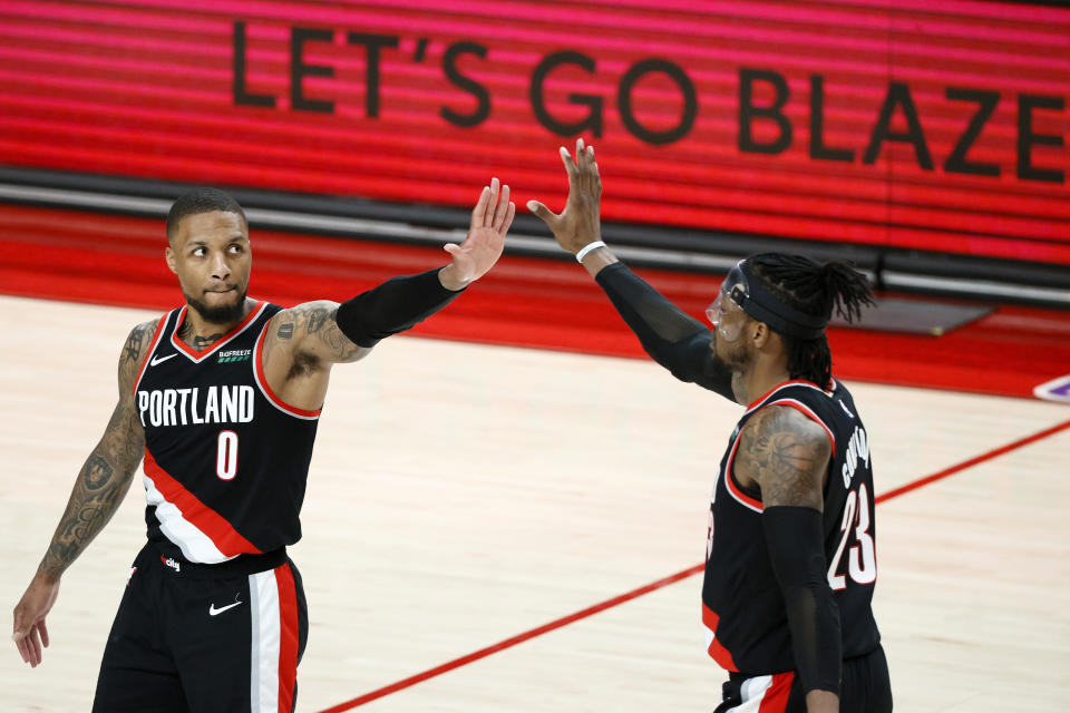 Damian Lillard (0) helped ice a 20-leg parlay at BetMGM. (Photo by Steph Chambers/Getty Images)