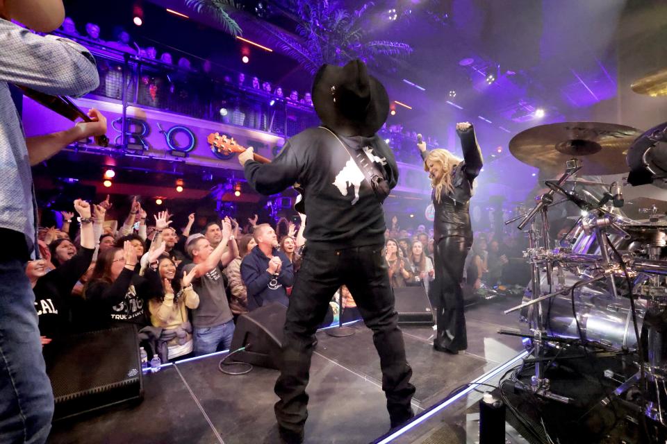 Garth Brooks performs onstage with Trisha Yearwood at their Amazon Music-streamed "Dive Bar" performance at their Friends In Low Places Bar & Honky Tonk Nov. 24, 2023, in Nashville, Tennessee.