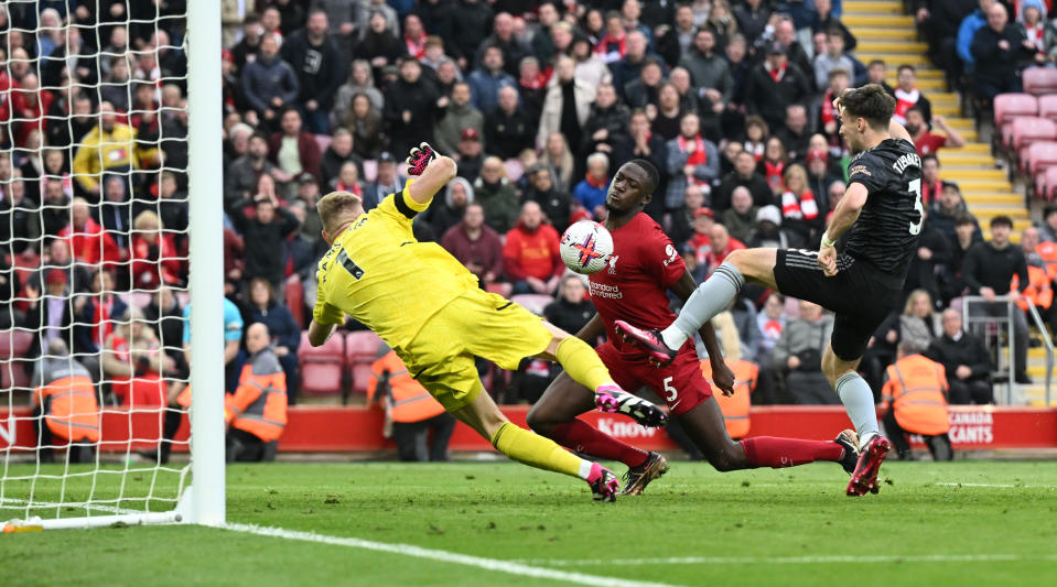 LIVERPOOL, ENGLAND - APRIL 09: ( THE SUN OUT,THE SUN ON SUNDAY OUT) Ibrahima Konate of Liverpool with Aaron Ramsdale of Arsenal  during the Premier League match between Liverpool FC and Arsenal FC at Anfield on April 09, 2023 in Liverpool, England. (Photo by Andrew Powell/Liverpool FC via Getty Images)