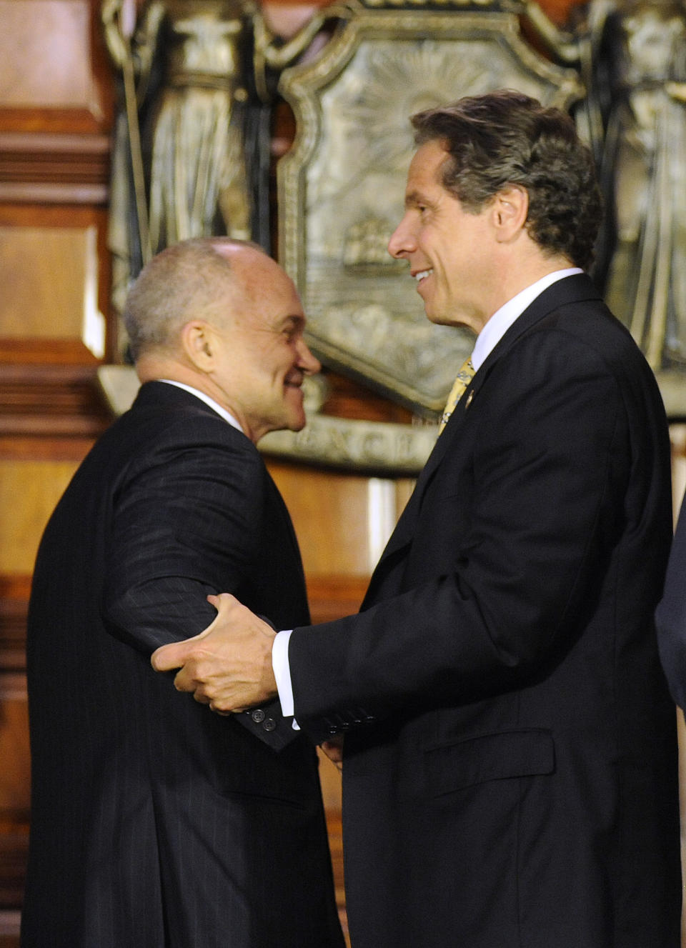 New York Gov. Andrew Cuomo, right, thanks New York City Police Commissioner Ray Kelly, after a news conference at the Capitol in Albany, N.Y., on Monday, June 4, 2012. Cuomo is proposing the decriminalization of the possession of small amounts of marijuana in public view. (AP Photo/Tim Roske)