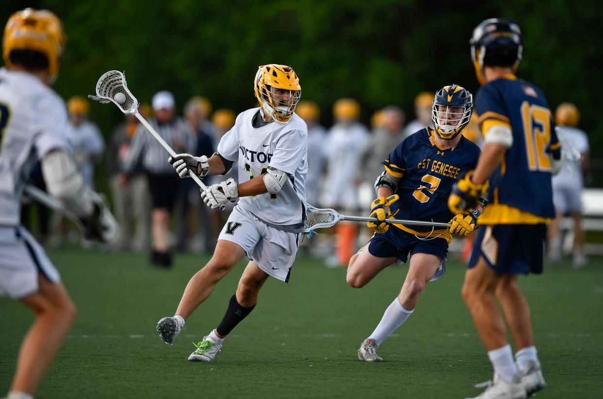 Victor's Thomas Gravino prepares to shoot against West Genesee during a NYSPHSAA Boys Lacrosse Championships Class B semifinal in Cortland, N.Y., Friday, June 9, 2023.