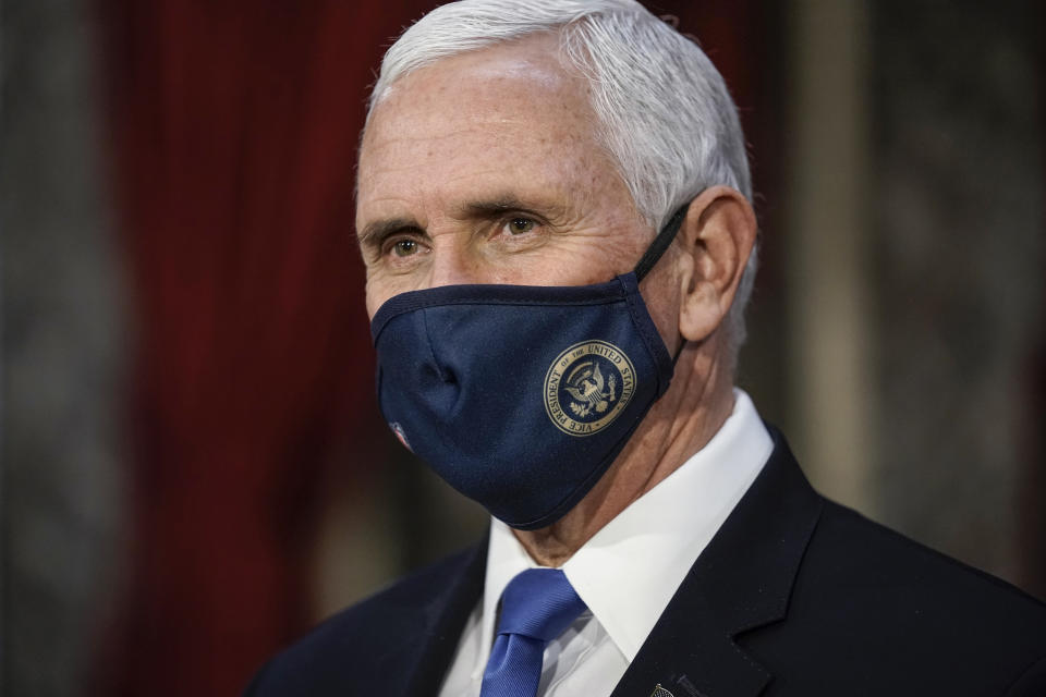 Vice President Mike Pence finishes a swearing-in ceremony for senators in the Old Senate Chamber at the Capitol in Washington, Sunday, Jan. 3, 2021. (AP Photo/J. Scott Applewhite, Pool)