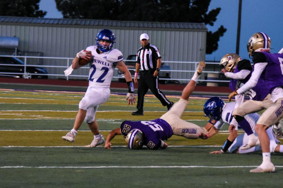 Farwell's Corey Stancell (22) skips past Panhandle defenders in the Panthers' 36-35 win over the Steers on Friday, Oct. 29, 2021 at Panther Stadium.