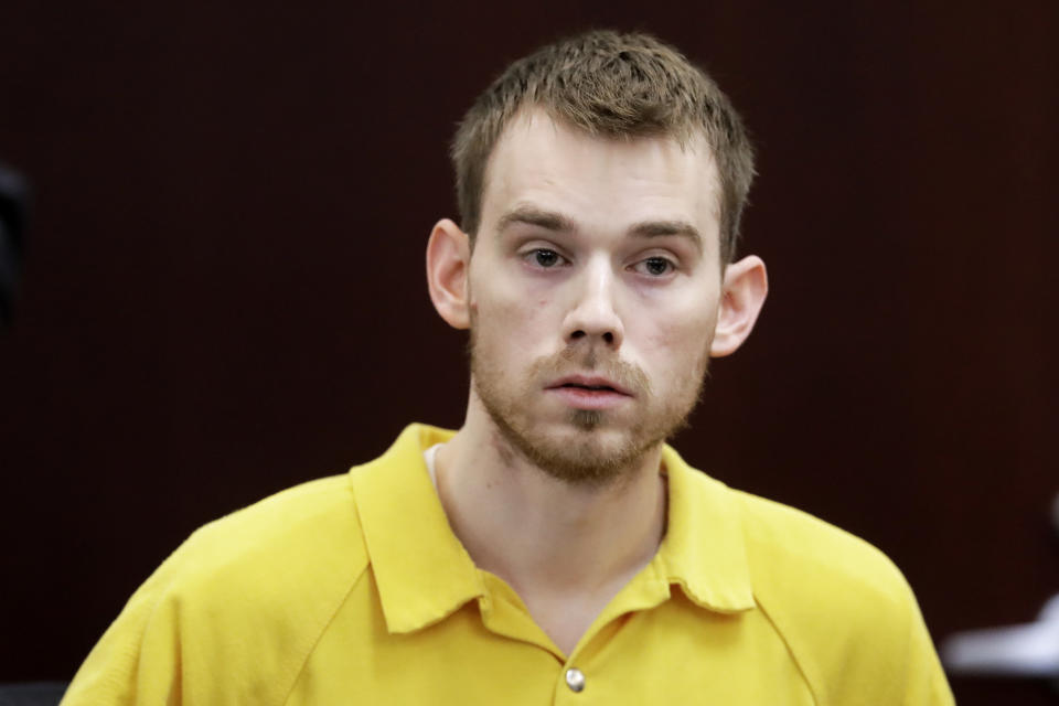 Travis Reinking appears at a hearing Wednesday, Aug. 22, 2018, in Nashville, Tenn. Reinking is charged with killing four people during a shooting at a Waffle House restaurant in Nashville in April. (AP Photo/Mark Humphrey)