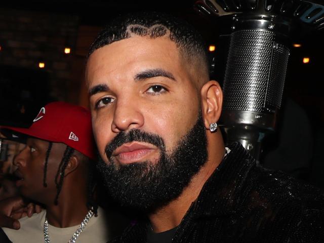 Drake gets Nike swoosh braided into his head