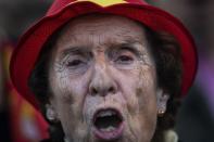 A Spain's far-right Vox Party supporter shouts "long live Spain" during Vox closing election campaign event in Madrid, Spain, Friday, April 26, 2019. On the political right, which the conservative Popular Party used to dominate but which has splintered into three main groups, the upstart far-right Vox party is making inroads. Citizens leader Albert Rivera, meanwhile, insists that his center-right party will only join a governing coalition with the conservatives. (AP Photo/Bernat Armangue)