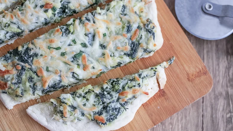 sliced spinach and cheese flatbread 