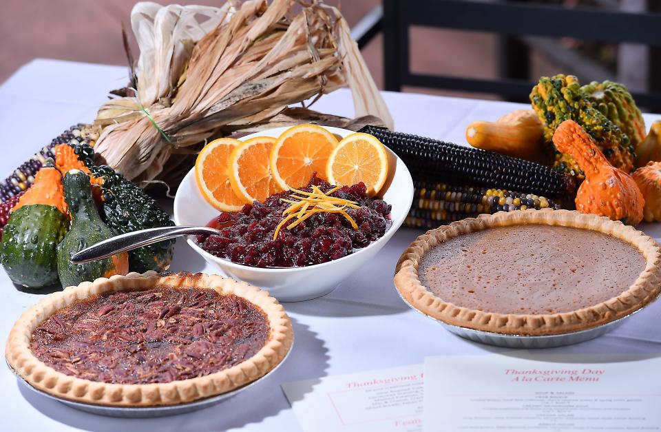 CityRange's Pecan pie, left, the restaurant's orange cranberry relish, center, with a Pumpkin pie.