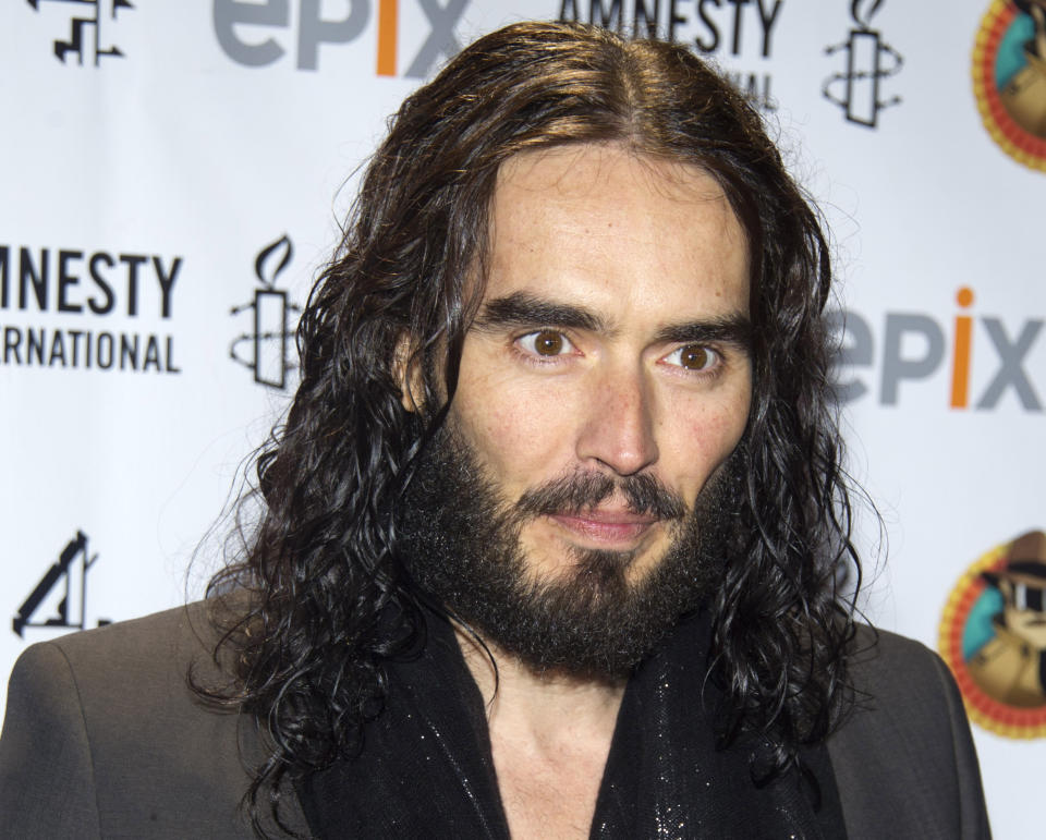 FILE - In this March 4, 2012 file photo, Russell Brand arrives to Amnesty International's "Secret Policeman's Ball" in New York. The MTV network says the 36-year-old comedian will host the 2012 MTV Movie Awards June 3, 2012. (AP Photo/Charles Sykes, file)