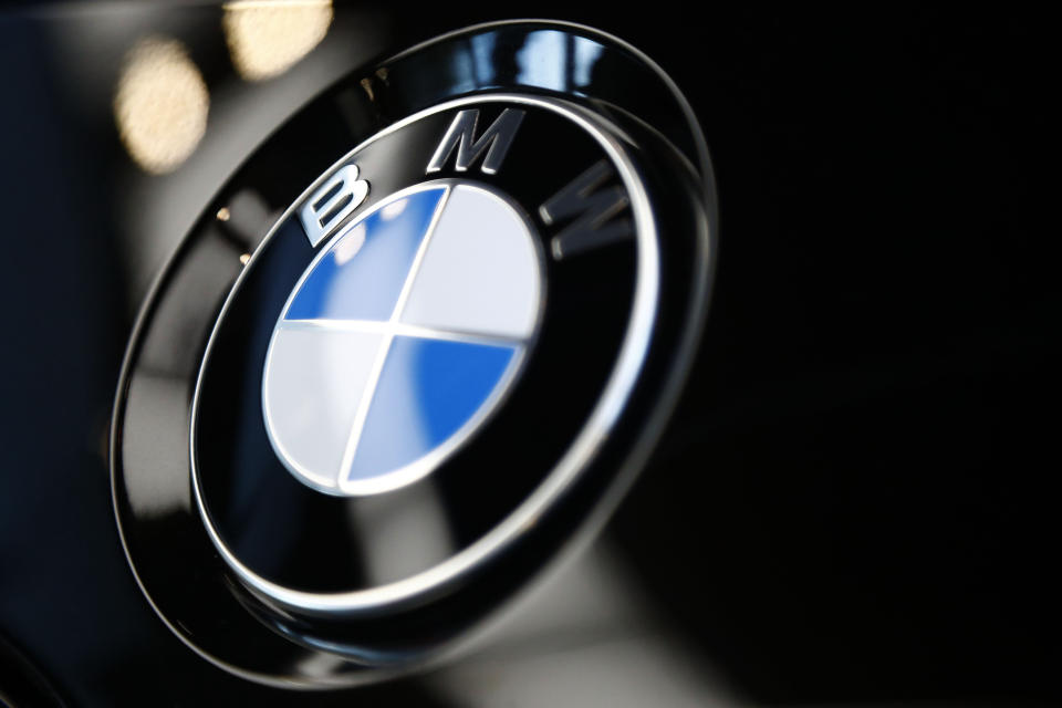 The logo of German car manufacturer BMW is pictured on a BMW car prior to the earnings press conference in Munich, Germany, Wednesday, March 20, 2019. (AP Photo/Matthias Schrader)