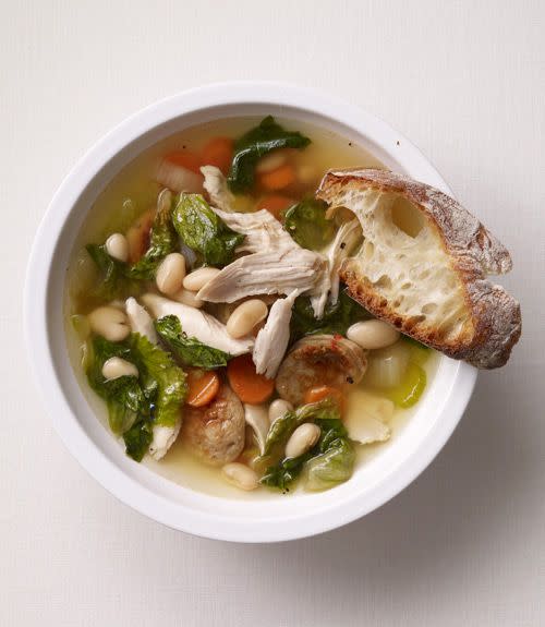 Chicken Soup with Smoked Sausage, White Beans, and Greens