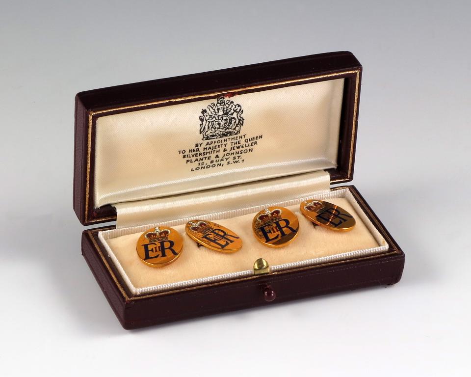Gold cuff links with the crown and cypher of Queen Elizabeth II, given by the queen to Jack Ford in 1976. Photo provided by the Gerald R. Ford Presidential Library & Museum.