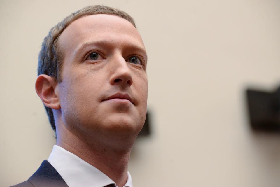 FILE PHOTO:  Facebook Chairman and CEO Mark Zuckerberg testifies at a House Financial Services Committee hearing in Washington, U.S., October 23, 2019. REUTERS/Erin Scott