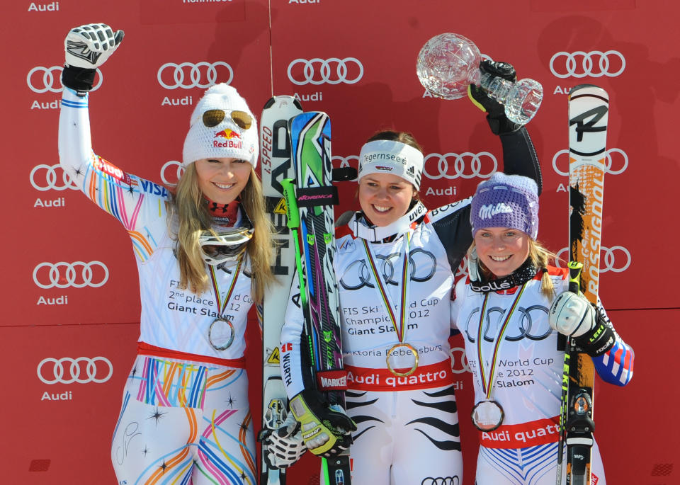 SCHLADMING, AUSTRIA - MARCH 18: (FRANCE OUT) Viktoria Rebensburg of Germany wins the last race and the Overall World Cup Giant Slalom title, Lindsey Vonn of the United States takes 2nd place, Tessa Worley of France takes 3rd place on March 18, 2012 in Schladming, Austria. (Photo by Alain Grosclaude/Agence Zoom/Getty Images)