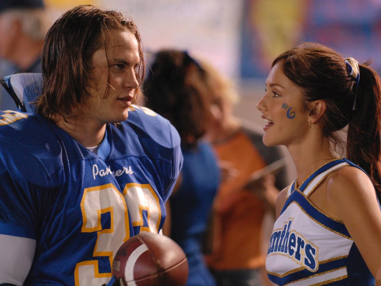 Taylor Kitsch and Minka Kelly on a 2006 episode of "Friday Night Lights."