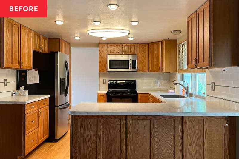 Kitchen with neutral wood cabinets and island.