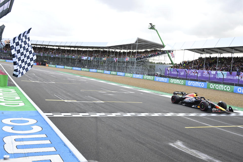 Red Bull driver Max Verstappen of the Netherlands crosses the finish line to win the British Formula One Grand Prix race at the Silverstone racetrack, Silverstone, England, Sunday, July 9, 2023. (Christian Bruna/Pool photo via AP)