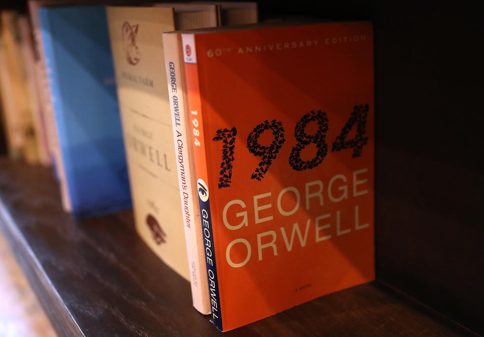 1984 and other books by George Orwell on a shelf