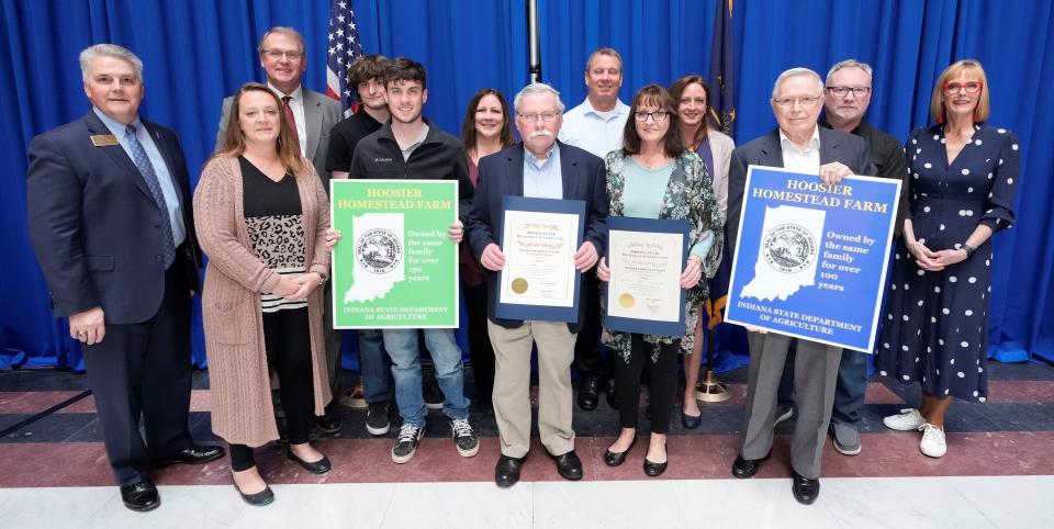 Members of the Mary (Jordan) Young family attended the ceremony and are pictured alongside state officials. Those pictured include, front row, from left: Director Bruce Kettler, Amy Martin, Brandon Young, David Young, Mary (Jordan) Young and Raymond Jordan. Back row: State Representative Bob Heaton, Colby Young, Shelly Young, Jace Rogiers, Dina Rogiers, Marvin Martin and Lt. Gov. Suzanne Crouch.