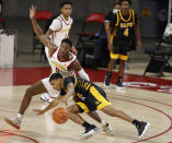 Iowa State guard Jalen Coleman-Lands, left, defends as Arkansas-Pine Bluff guard Nicholas Jones, center, loses control of the ball during the second half of an NCAA college basketball game, Sunday, Nov. 29, 2020, in Ames, Iowa. (AP Photo/Matthew Putney)