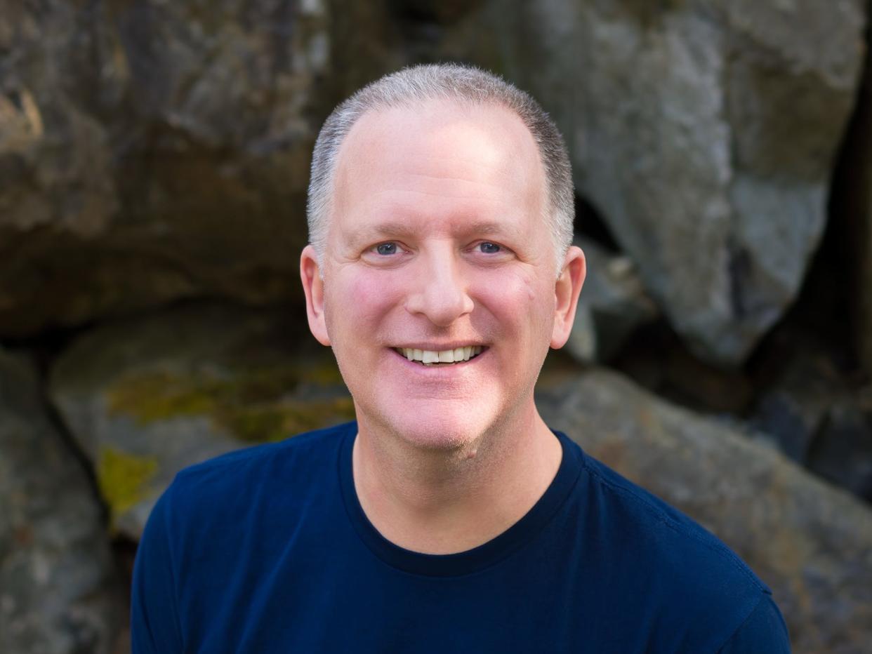 A headshot shows Mike Swanson smiling