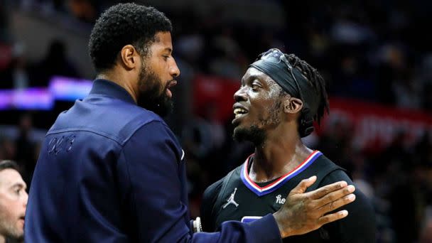 PHOTO: FILE - Paul George congratulates Clippers teammate Reggie Jackson for scoring 36 points leading the way to a 132-111 win over the Lakers at Crypto.Com Arena. (Robert Gauthier/Los Angeles Times via Getty Images, FILE)