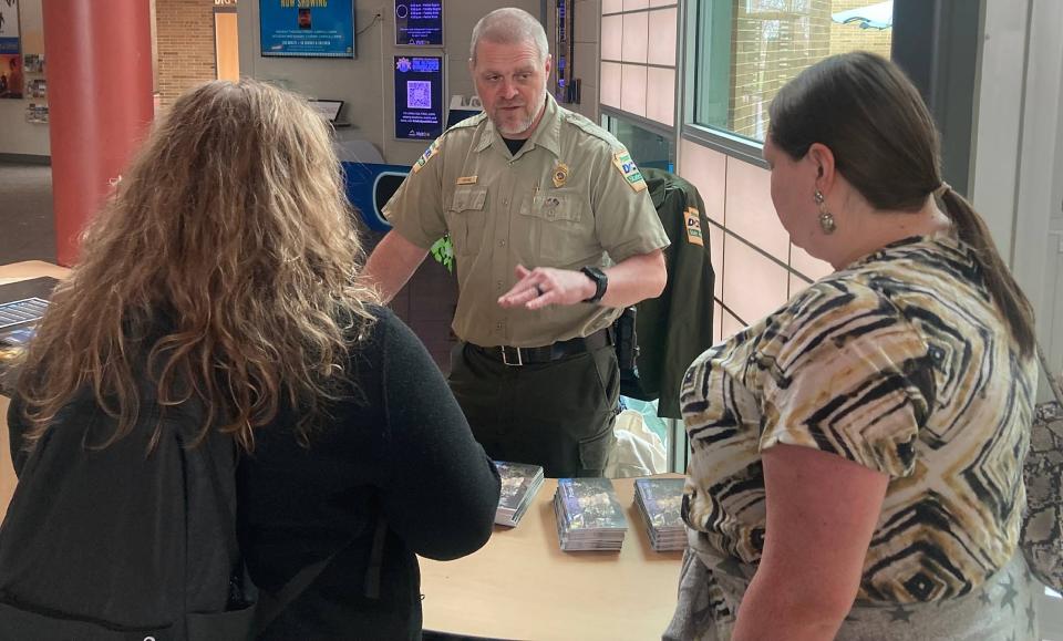 Matt Greene, Director of Operations for Presque Isle State Park, is shown on Monday greeting visitors at Tom Ridge Environmental Center.