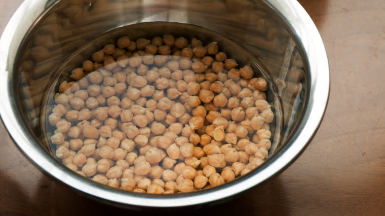 chickpeas soaking in water bowl