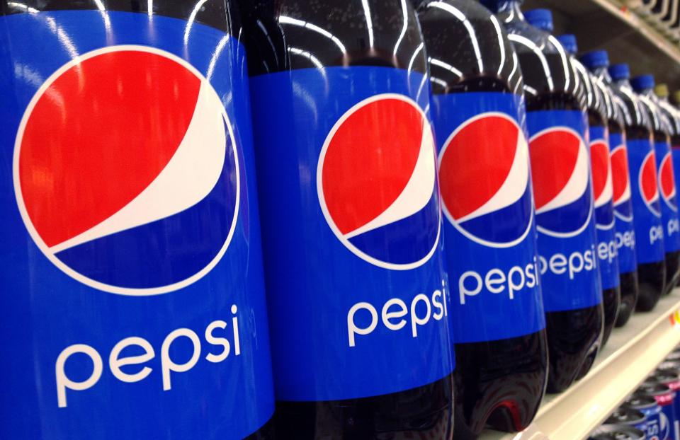 FILE - In this July 9, 2015, file photo, Pepsi bottles