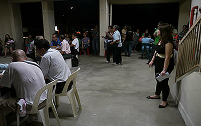 Residents waiting to consult WP's elected MP Yaw Shin Leong at Hougang Avenue 5, Blk 310 on Wednesday evening. (Yahoo! photo/ Faris Mokhtar)