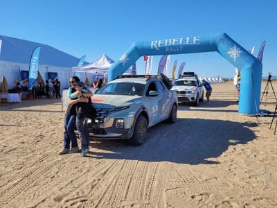 Kristin Shaw and Jill Ciminillo pose in front of the Brute Squad’s 2022 Hyundai Santa Cruz at the finish of the Rebelle Rally in Glamis, Calif., on Oct. 14, 2022.