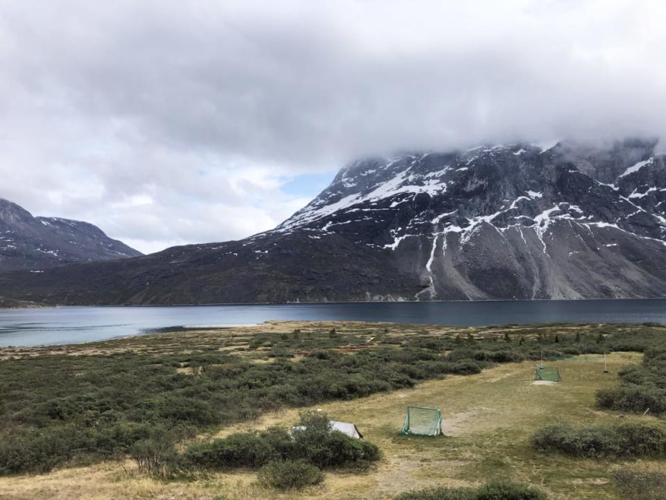 A photograph of a football pitch at the end of the world in Greenland.