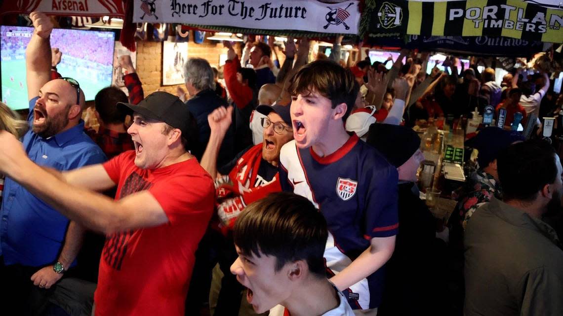 Fans at Double Tap Pub in downtown Boise celebrate Team USA’s goal in the first half against Wales during the World Cup Group A opener in Qatar, Monday, Nov. 21, 2022. Wales tied the game in the second half, forcing a draw.