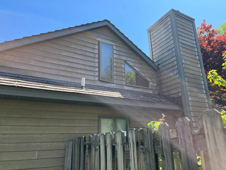 Black mold is growing on siding at 7312 Foley Drive in Belleville, where half of a duplex has been vacant for five years.