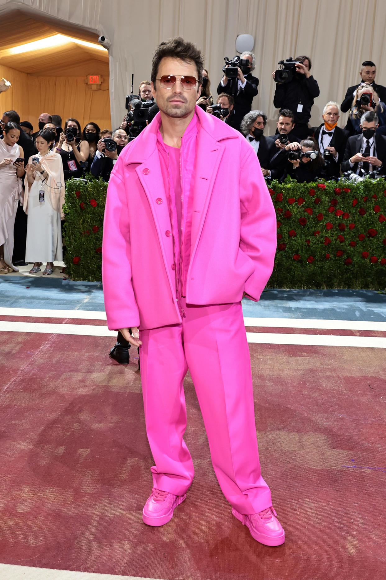 Sebastian Stan at this year’s Met Gala, wearing an all-pink look from Valentino. - Credit: Getty Images