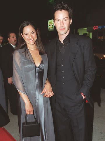 <p>Bei/Shutterstock</p> Kim Reeves and Keanu Reeves at the premiere of 'The Matrix' in 1999