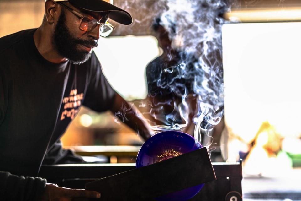 Glassblower Cedric Mitchell at work in his El Segundo studio.