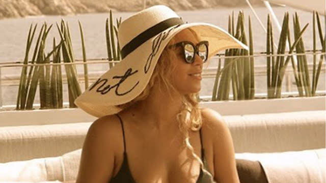 The Carter family is clearly still living their best lives. Beyoncé continues to post vacation snaps to Instagram, this time sharing cute candids of her 3-year-old daughter, Blue Ivy, and husband, Jay Z, as well as her own banging bikini bod. <strong>WATCH: Blue Ivy Shows Off Her Awesome Dance Moves During Vacation</strong> The 34-year-old singer posted photos of her family enjoying their holiday on Italy's Amalfi Coast on Saturday. One photo shows the "Drunk in Love" singer and her little girl in matching straw hats as they sit in a swimming pool aboard a luxury yacht. Another captures a sweet father-daughter moment, with the 45-year-old hip hop mogul giving Blue Ivy a kiss on her cheek. Besides the family-friendly photos, Beyoncé also showed off her "surfboart" body, posing in a sleek one-piece with a sexy plunging neckline and cutouts. This vacay has been all about romance, rest and relaxation for the Carters, as Queen Bey has been seen jet-skiing, sipping champagne and indulging in a little PDA with her hubby. <strong>WATCH: Beyoncé and Jay Z Pack on the PDA</strong> Though she's usually fiercely private, Beyoncé has been proudly showing off her family and their vacation in a number of Instagram posts these past weeks, leaving the rest of us with a serious case of FOMO. Check out more of Beyoncé's Kodak moments from her Roman holiday with Jay Z and Blue Ivy in the video below.