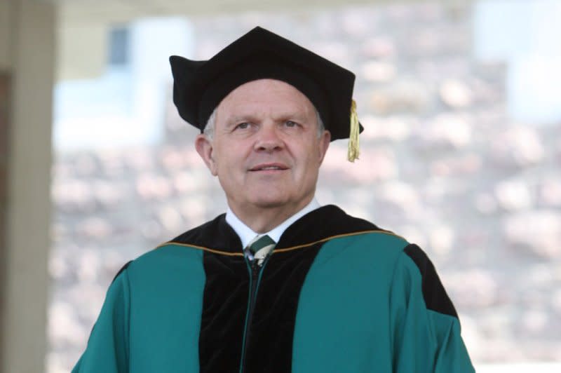 Adventurer Steve Fossett waits to receive an honorary doctor of science at commencement ceremonies at Washington University in St. Louis on May 19, 2006. On February 15, 2008, Fossett was declared legally dead five months after he vanished while flying in Nevada. File Photo by Bill Greenblatt/UPI