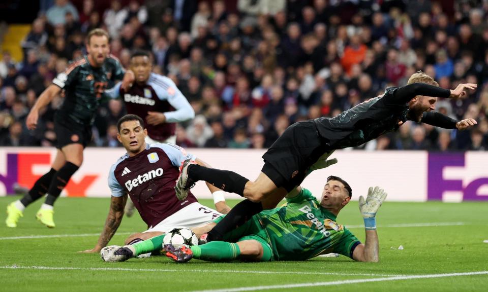 <span>Konrad Laimer’s leg, meet Emiliano Martínez’s groin.</span><span>Photograph: Alex Pantling/Getty Images</span>