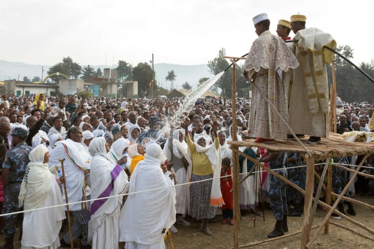 Timkat entails a mass baptism for the faithful. In Addis Ababa, worshippers were hosed with holy water -- in the countryside, believers dive into rivers