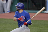 Chicago Cubs' David Bote watches a two-run single in the fifth inning of the team's baseball game against the Cleveland Indians, Wednesday, Aug. 12, 2020, in Cleveland. (AP Photo/Tony Dejak)