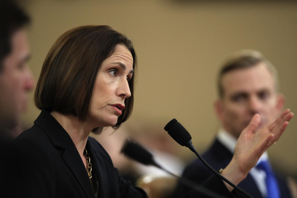 Former White House national security aide Fiona Hill, and David Holmes, a U.S. diplomat in Ukraine, right, testify before the House Intelligence Committee on Capitol Hill in Washington, Thursday, Nov. 21, 2019, during a public impeachment hearing of President Donald Trump's efforts to tie U.S. aid for Ukraine to investigations of his political opponents. (AP Photo/Manuel Balce Ceneta)